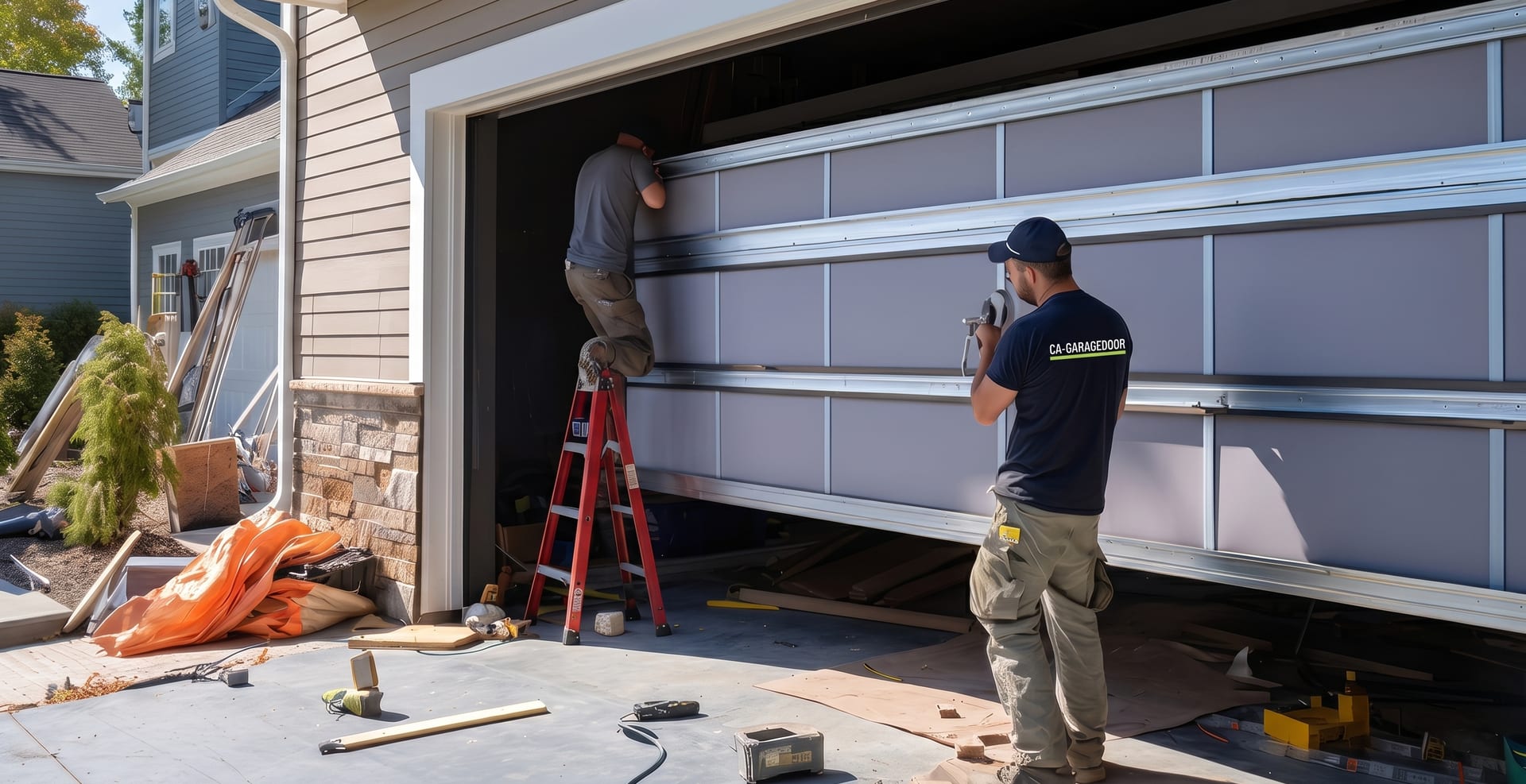 CA-GARAGEDOOR technicians repairing a sectional garage door at a two-story California home